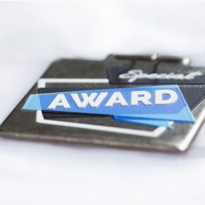 Q Medalje med plus print
