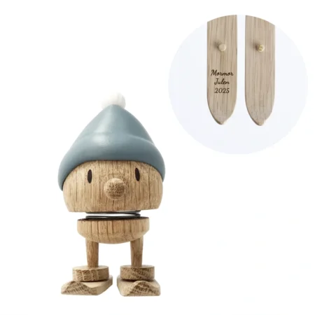 Jule hoptimist med blå hue og gratis gravering på ski